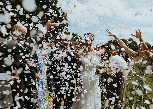 Confetti shot at this stunning summer wedding at The Gardens in Yalding