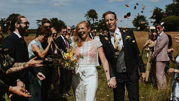 A fun and colourful and relaxed festival style wedding celebration in Horsted Keynes, West Sussex