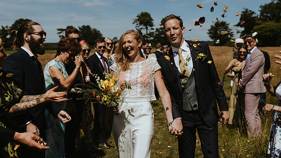 A fun and colourful and relaxed festival style wedding celebration in Horsted Keynes, West Sussex