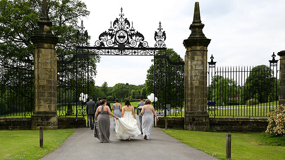 Wedding photographs at the gates of Worth School, Worth,  West Sussex