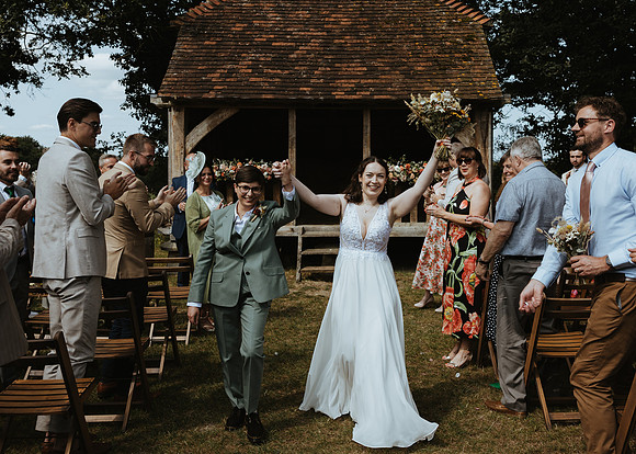 A relaxed summer barn wedding at Gildings Barns near Dorking in Surrey
