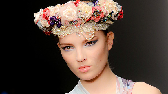 The floral head-dress