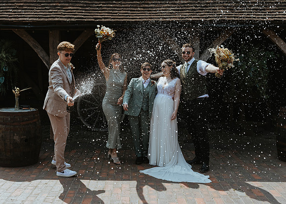 A relaxed summer barn wedding at Gildings Barns near Dorking in Surrey