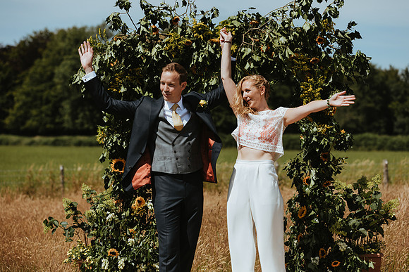 A fun and colourful and relaxed festival style wedding celebration in Horsted Keynes, West Sussex